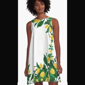 Amalfi lemon swing dress
.